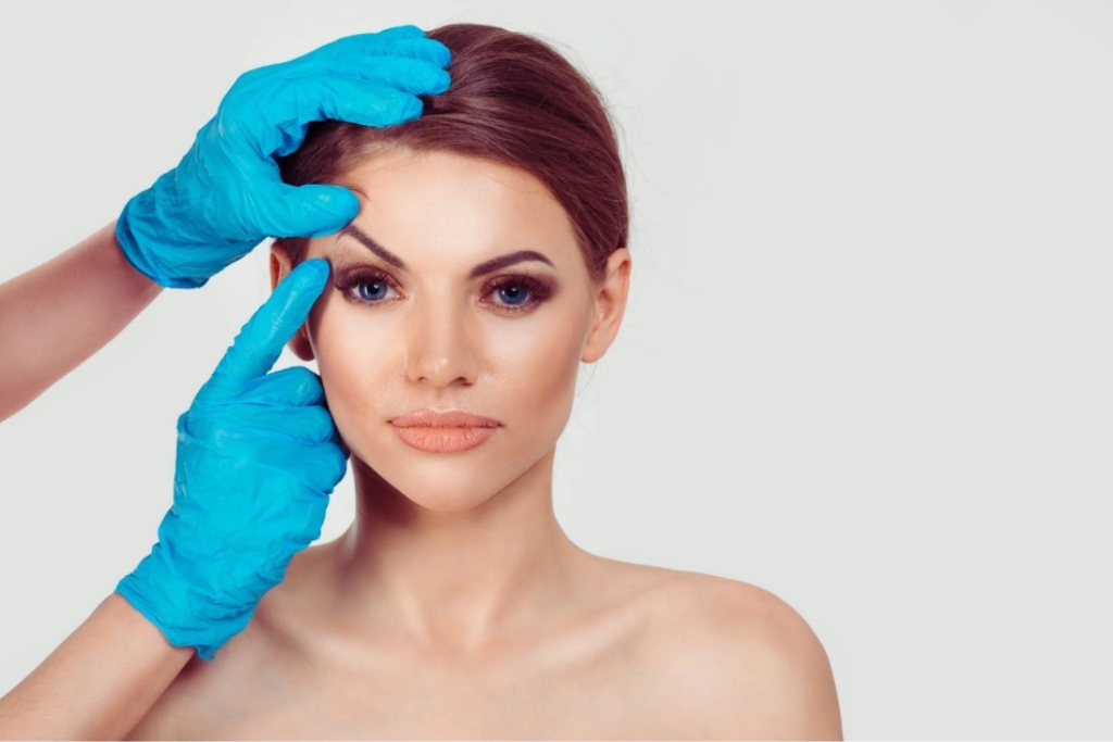 Upper eyelid blepharoplasty. Beautiful middle-aged woman getting ready for eyelid lift plastic surgery.